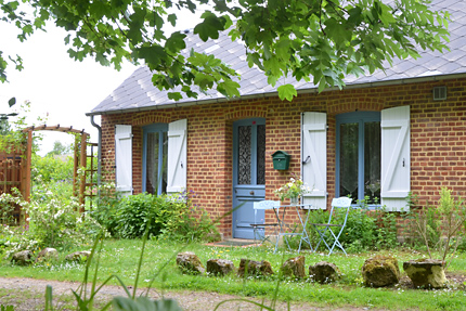 het vakantiehuis met poort naar de tuin